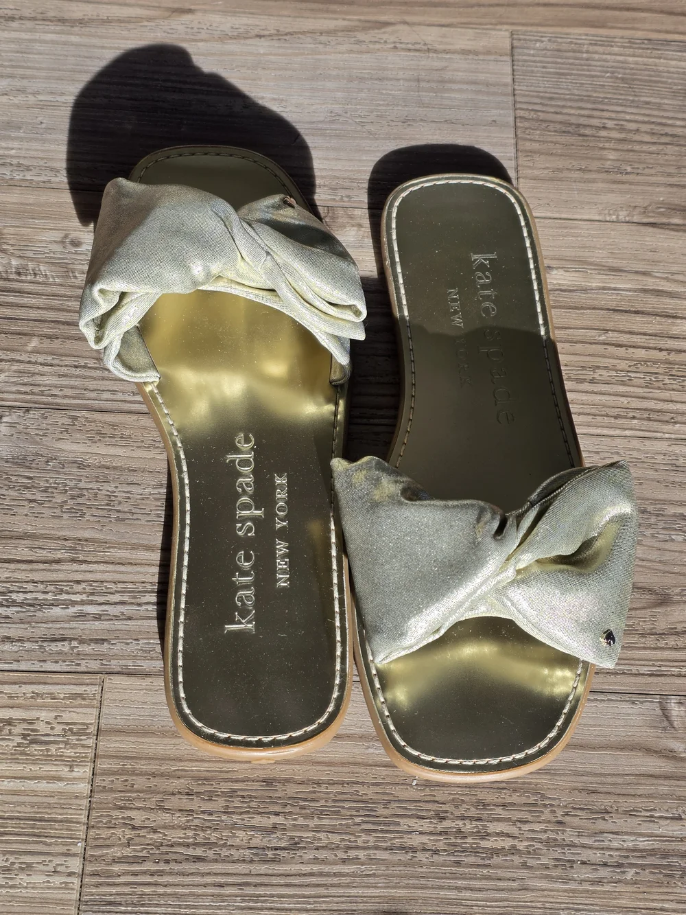 kate spade New York Metallic Gold Bow Slide Sandals